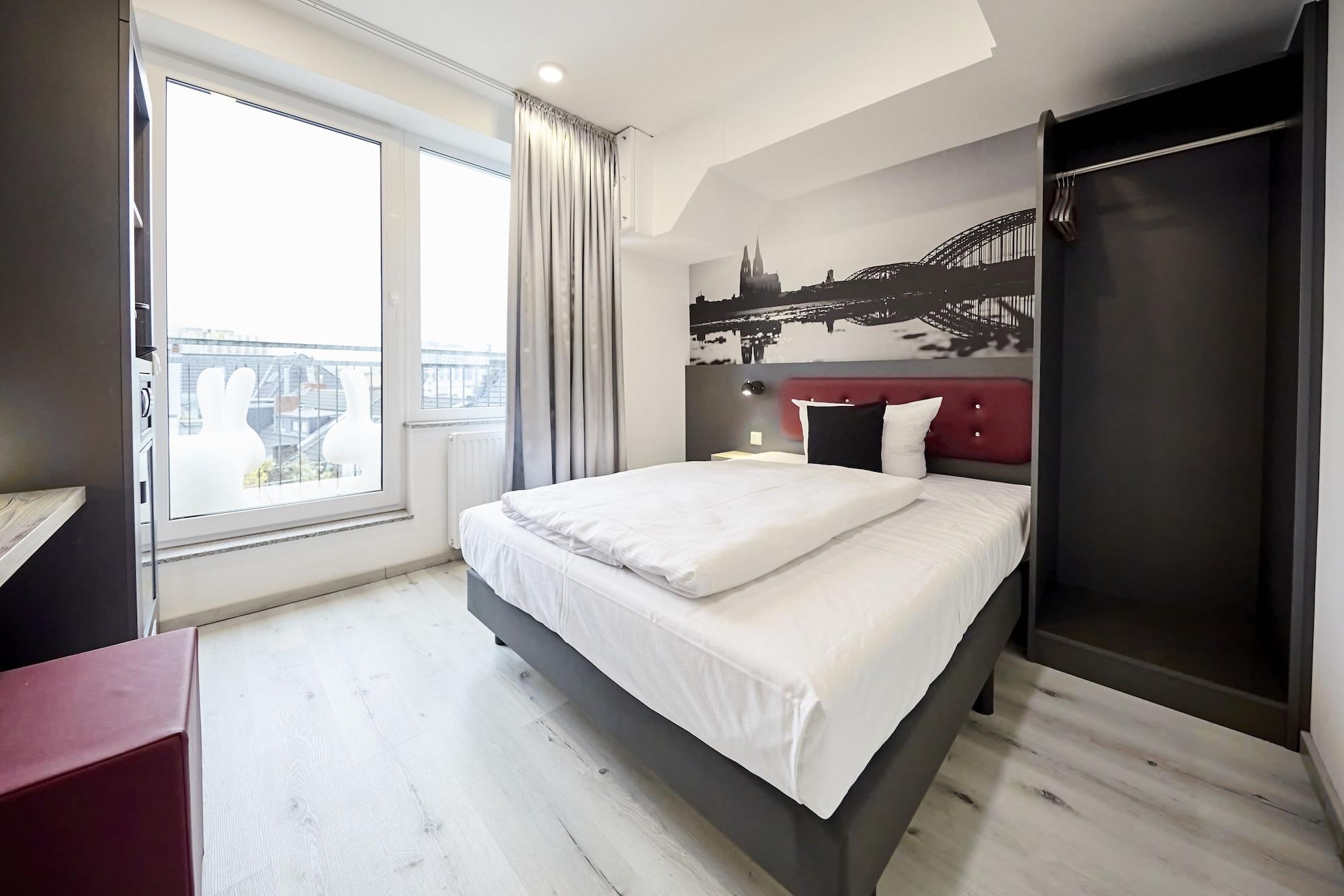 Domspatz Boardinghouse - Kontaktloser Self Check-in Hotel Köln